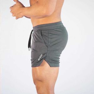 Shorts pour hommes Shorts d'entraînement Solid Fitness Territoire Sports Shorts de natation Hommes Running Gym QuickDrying Tie Plus Size Sportwear Z0503