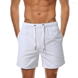 Shorts pour hommes à la mode course Absorption de la sueur plage ceinture élastique été couleur unie lâche Fitness habillage
