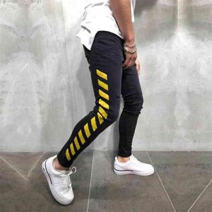 Jean noir skinny pour hommes rayures latérales jaunes Hip Hop Streetwear bord brut déchiré imprimé rue coton léger 210723