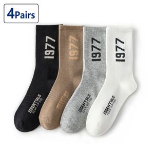 Chaussettes pour hommes chaussettes hommes femmes printemps et automne hiphop mode chaussettes personnalité mâle 1977 ans chaussettes sport skateboard loisirs chaussette 230322