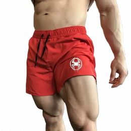 Shorts de sport pour hommes Baggy Shorts de marque de luxe Gym Coréen Commentaires De nombreux vêtements Pantalons courts pour hommes Séchage rapide Ste Islands Man 63GA #