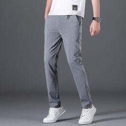 Trajes de hombre Blazers Hombres Pantalones Traje Hombre Pantalones delgados Verano Formal Vestido de negocios Cintura alta Rayas Casual Tamaño grande Corea del sur Hombres