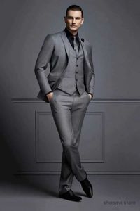 Trajes para hombres Blazers Nuevo traje gris para hombres Traje de novio Trajes de hombre formales baratos para la boda Los mejores hombres Slim Fit Novio Esmoquin para hombre (chaqueta + chaleco + pantalones)