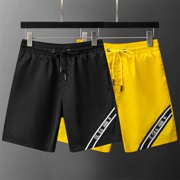 Short de surf pour hommes Surf Beach Trunks Maillot de bain Lettre imprimée 2024 Nouveau style Pantalon décontracté Homme Casual Streetwear Pantalon de survêtement Taille asiatique M-3XL