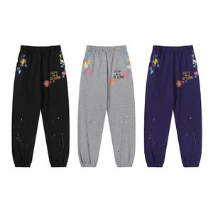 Pantalones deportivos para hombres Marca de moda estadounidense Splash-ink Tie-dye con estampado de letras para hombres y mujeres, pantalones casuales sueltos y pantalones tobilleros