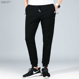 Pantalons de survêtement pour hommes grande taille grand 5xl Sportswear taille élastique décontracté coton pantalon de survêtement pantalon extensible mâle noir Joggers 8XL L230520