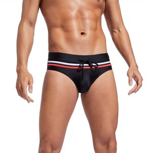 Swimwear masculin 2024 Nouveau triangle de couleur solide à taille basse sexy et anti-maladresse