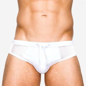 Maillots de bain pour hommes Européens et américains en nylon maille couture blanc maillot de bain été translucide sexy plage short de bain avec poussoir