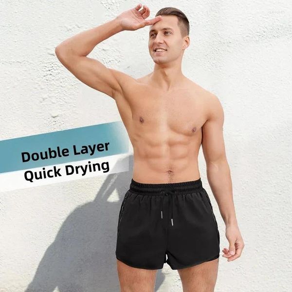 Swimons de maillots de bain pour hommes Pantalon Double couche anti-awkward lâche rapide à sec respirant de plage de plage