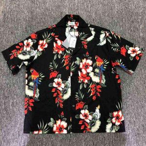 T-shirts pour hommes Designer Rhude T-shirt Hommes Femmes Floral Perroquet Rouge Fleur à manches courtes Impression High Street Fashion Tshirt Uwiu de haute qualité