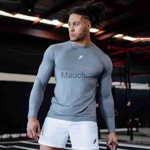 T-shirts pour hommes Nouveaux sports de fitness à manches longues hommes sports loisirs course basket-ball fitness cloes collants absorption d'humidité sueur Tshirt J230721