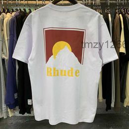 T-shirts pour hommes Rhude Sunset T-shirt avec motif de montagne enneigée américain lâche hommes couple d'été à manches courtes JLNH