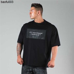 Camisetas para hombres Ropa de entrenamiento Algodón Loose fit Gyms Camisetas para hombre Camiseta de manga corta Muscle Gyms Ropa de fitness Bodybuilding Tees Tops J230526