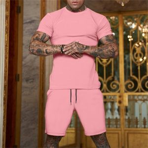 Survêtement pour hommes 2 pièces ensemble été solide sport surdimensionné costume ample à manches courtes t-shirt et short décontracté mode homme vêtements 220705