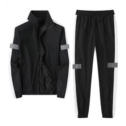 Tracksuits voor heren 2023 Spring en herfst Sportpakken Jassen broek mode reflecterende strips koppels losse pak