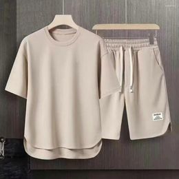 Survêtements pour hommes 2pcs / set hommes tenue d'été o-cou à manches courtes t-shirt élastique cordon taille large jambe shorts ensemble activewear style coréen