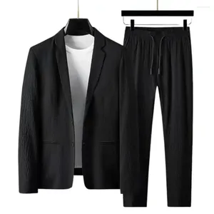 Chándales para hombres Pantalones con cordón Blazers Conjuntos Chándal Primavera Otoño Trajes plisados Trajes formales casuales delgados Negro Blanco Un solo botón