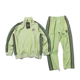 Tracksuits voor heren groen naalden jas set vlinder geborduurd awge side side suit broek jassen pakken 230311