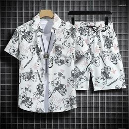 Sombriz de canciones para hombres Camiseta de playa hawaiiana conjunto holgado combo de manga corta para las vacaciones de viaje de viaje de Hainan dibujos animados de media manga de alas floral