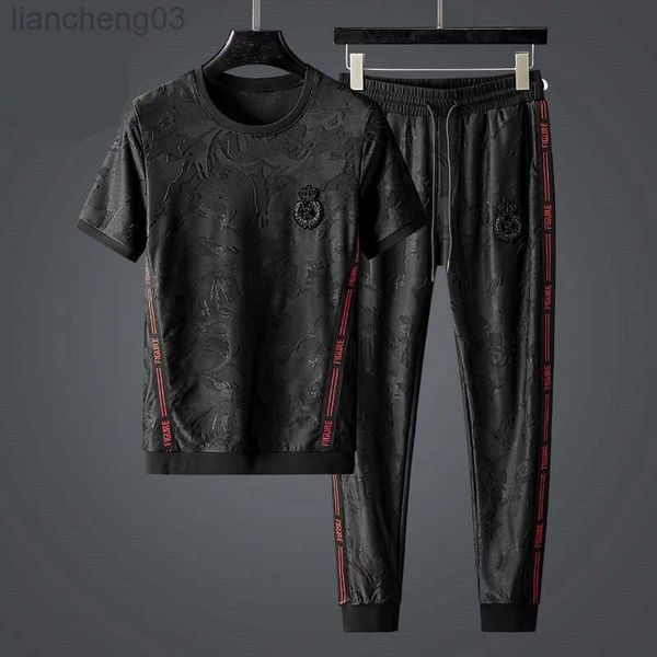 Survêtements pour hommes Costume de sport de loisirs de luxe haut de gamme pour hommes été ample tendance coréenne ensemble de vêtements pour hommes T-shirt à manches courtes pantalon deux pièces W0329