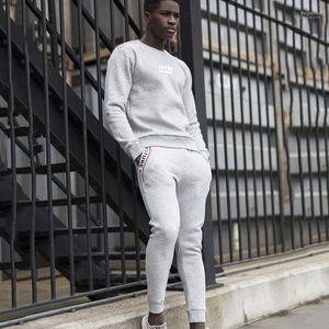 Parcours masculins Les gymnases masculins sets 2 pièces Sweats Sweats SweetSuis Suison Sweat Sweat à capuche et pantalon Strips Sweatshirt Sweats-shirts Tissu de sports