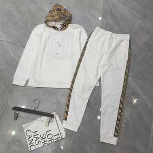 Les survêtements masculins épissent des pulls à fermeture éclair avec des culottes style de loisirs M-3xl Tissu de gaufre épaissi