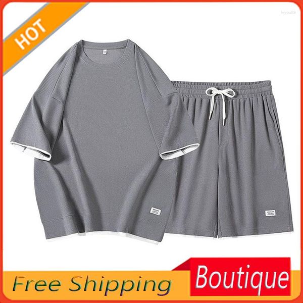 Survêtements pour hommes costume de sport et short gaufré pour femmes manches courtes t-shirt été simplicité pantalons décontractés mode ensemble deux pièces