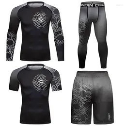Chándales para hombres Ropa deportiva Cody Lundin Competencia de compresión MMA Rashguard Camiseta Muay Thai Shorts 4pcs / sets Entrenamiento Ropa de combate para
