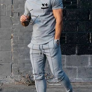 Tracksuits voor heren Spring Summer Men Casual tweedelig sets mode bedrukte T-shirts met korte mouwen en slanke broekpak heren sportkleding outfits 221006