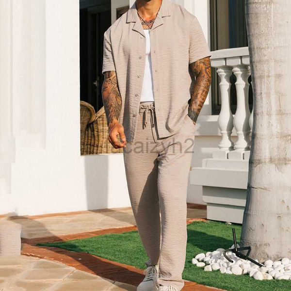 Parcours masculin Streetwear 2024 Nouvelle chemise à manches courtes Pantalon décontracté en deux pièces tendance de mode masculine Couleur solide