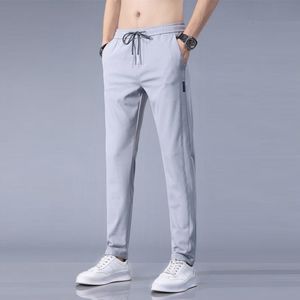 Survêtements pour hommes été décontracté jeunesse glace soie pantalon sport mince grande taille Leggings droite Version coréenne 221122