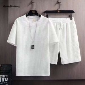 Suits-survêtements pour hommes sets d'été coréens mode 2 pièces Vêtements décontractés joggeurs plaid t-shirtshorts tenue 230406