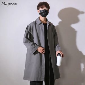 Survêtements pour hommes Trench Hommes Manches longues Automne Lâche Solide 4Color Mode Streetwear Allmatch Vintage Noir Étudiants Manteaux de printemps 231023