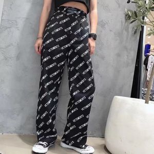 Chándales para hombres VETEMENTS Pantalones casuales Carta con estampado completo Hombres Mujeres 1 Pantalones de gran tamaño 230823