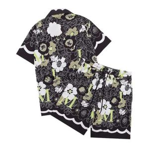 Camisas para hombres Conjunto de camisetas de diseñador Estampado floral hawaiano Camisa casual y camisa corta de seda suelta Camisetas para mujer Camiseta para hombre Pantalones cortos de playa de arena Camisa de verano 15