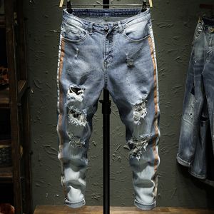 Men Skinny Stretch gescheurde jeans mannen geprinte zijstreep slanke heren jeans joggers denim broek zipper designer broek 201111