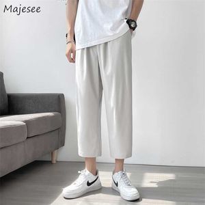 Mannen solide casual broek enkel lengte zomer ademend losse mode eenvoudige broek rechte koreaanse stijl chique dagelijkse merk mannelijke y0811