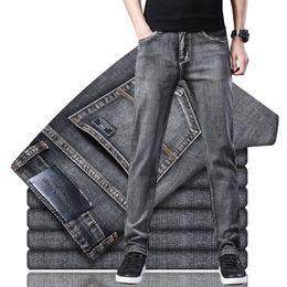 Pantalones vaqueros ajustados elásticos para hombre, pantalones vaqueros de moda de estilo clásico informal de negocios, pantalones negros, azules y grises para hombre