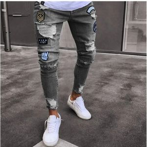 Mannen Rettery gescheurde mager fietser borduurwerk cartoon print jeans vernietigd gat slank fit denim hoge kwaliteit hiphop zwart 240420