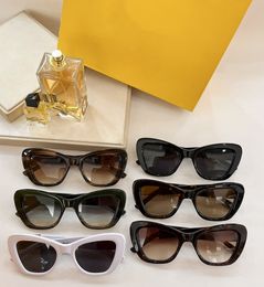 Occhiali da sole da uomo per donna Ultimi occhiali da sole di moda di vendita Occhiali da sole da uomo Gafas De Sol Lenti in vetro UV400 con scatola di corrispondenza casuale 40069