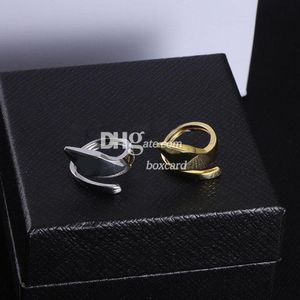 Hombres Mujeres Anillos de diseñador Anillos de oro vintage Matal para amantes Anillos chapados en letras elegantes con caja de regalo