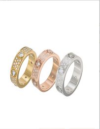Heren Dames Liefdesring Mode-sieraden Bruiloft Verloving Bruid Geschenk Feest Ster Diamanten ring Rosé zilver Goud Roestvrij staal Dames 2347526