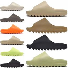 Zapatillas de moda Zapatilla de diseñador Sandalias de piel de becerro para mujer Almohada para piscina Sandalias cómodas Cierre de gancho y bucle Zapatillas de mula Goma greenwig