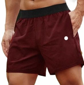 Hommes Yoga Shorts de sport Fitness en plein air Séchage rapide Lululemens Shorts pour hommes Couleur unie Casual Running Lulu Quarter Pant Lulus