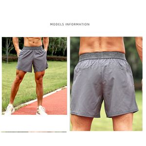Hombres Yoga Deportes Pantalones cortos Fitness al aire libre Secado rápido Color sólido Casual Running Quarter Pant5E