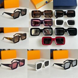 Diseñador de lujo para hombres y mujeres 1.1 Gafas de sol transparentes Millionaires con bisagras de hardware S-lock decoración de letras de metal en las patillas Borde impreso Z1592E anteojos