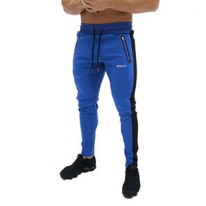 Heren bodybuilding broek sportscholen rits pakket merk kleding katoen afdrukken broek fitness workout jogger joggingbroek