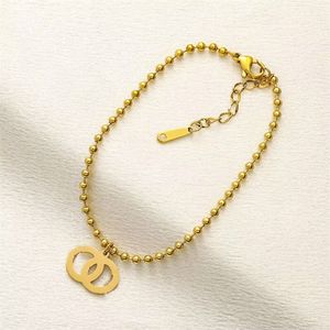 Bracelet pour hommes designer bracelet de luxe en perles lettre dorée étiquette volante en acier inoxydable lisse exquis bracelets pour femmes décontracté à la mode zb103
