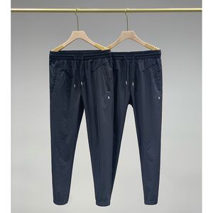 Hommes pantalons décontractés à la mode respirant hommes sport rapide Srying pantalon élastique lâche cravate pantalon 2022 vêtements d'été