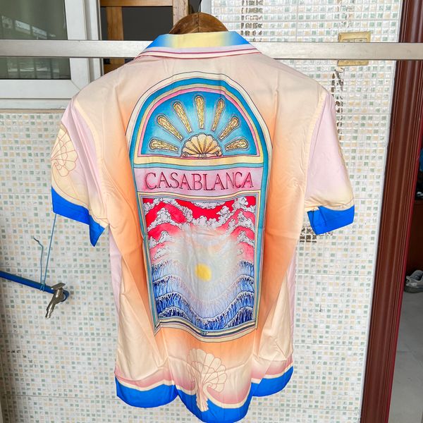 Chemises décontractées pour hommes Casablanca Womens Shirt Island Sunrise Paysage Imprimer Hawaii Lâche Respirant À Manches Courtes Real Po 230718